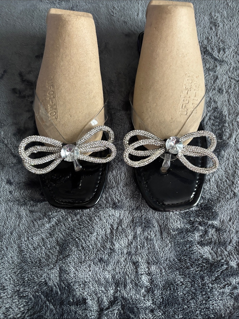 Bella Marie Black Patent Thong Sandals with Crystal Bow